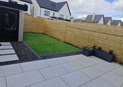 Garden revamp project Waterford, including patio, custom walkway, edging, chipping and fencing installation