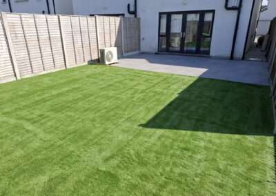 Artificial grass installation in a large Waterford back garden