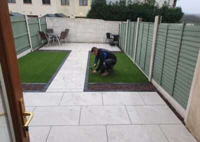 Waterford business installing artificial grass and patio. Small garden design